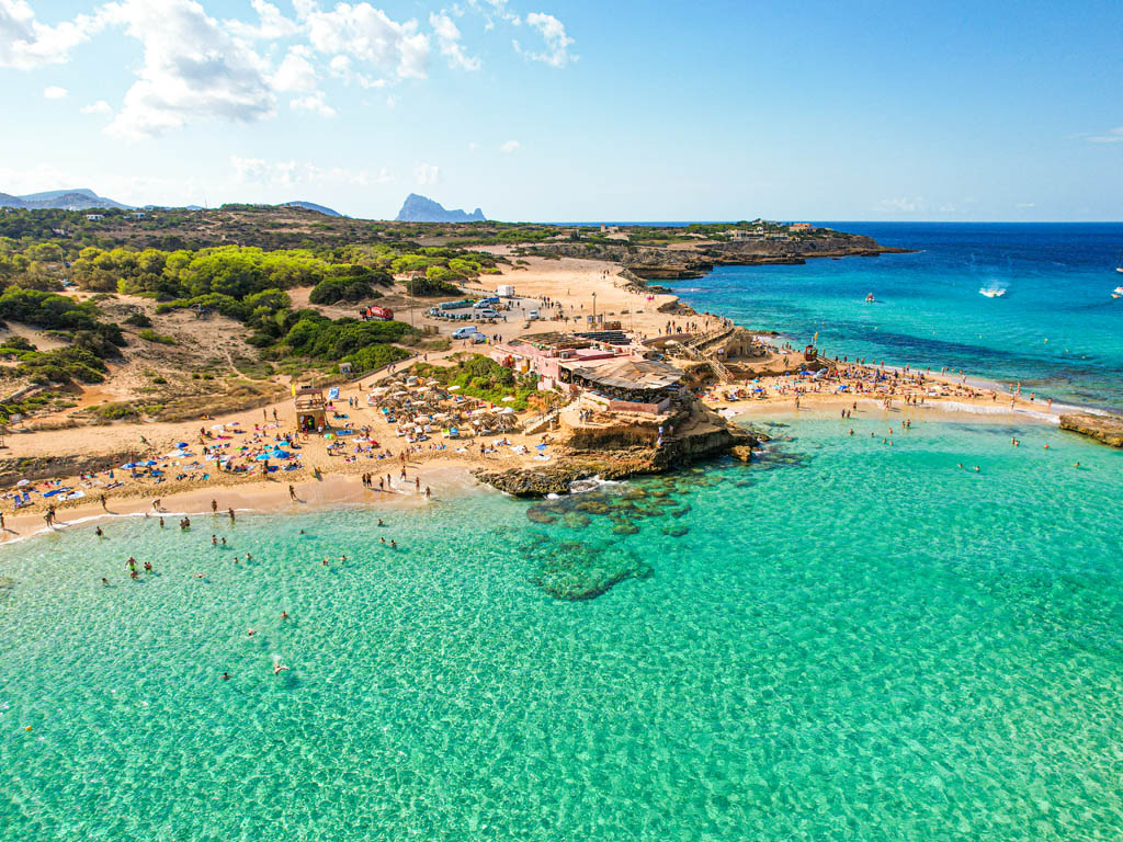 Padel court on Ibiza with the sea behind it